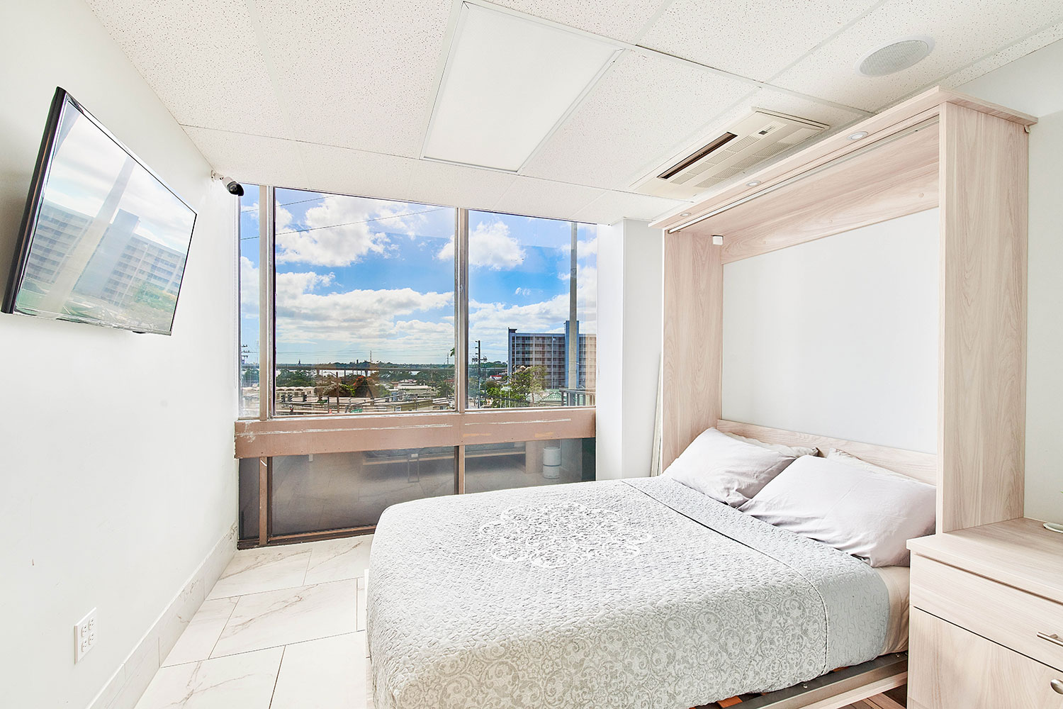 Modern sleep center room with comfortable bed and monitoring equipment representing quality sleep medicine care in Hawaii